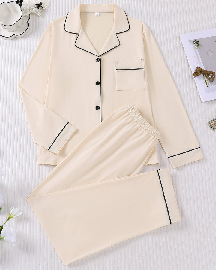 Completo casual chic donna: cardigan a maniche lunghe e pantaloni slim. Ideale per un look moderno e versatile.