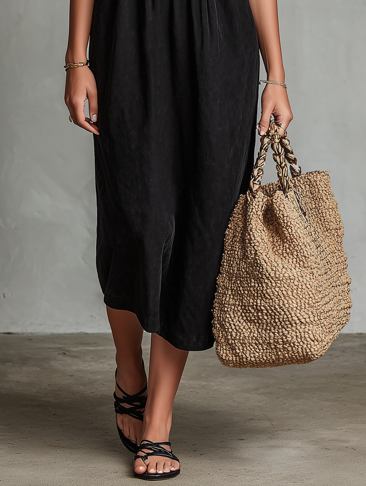Abito midi donna stile boho con finitura effetto suede e dettagli ricamati, un capo chic.
