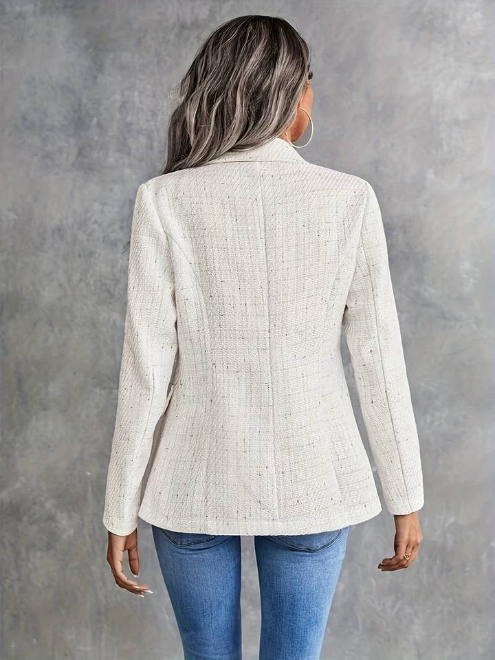Giacca blazer donna con colletto a revers e maniche lunghe. Abbigliamento ufficio e look casual chic per moda femminile.