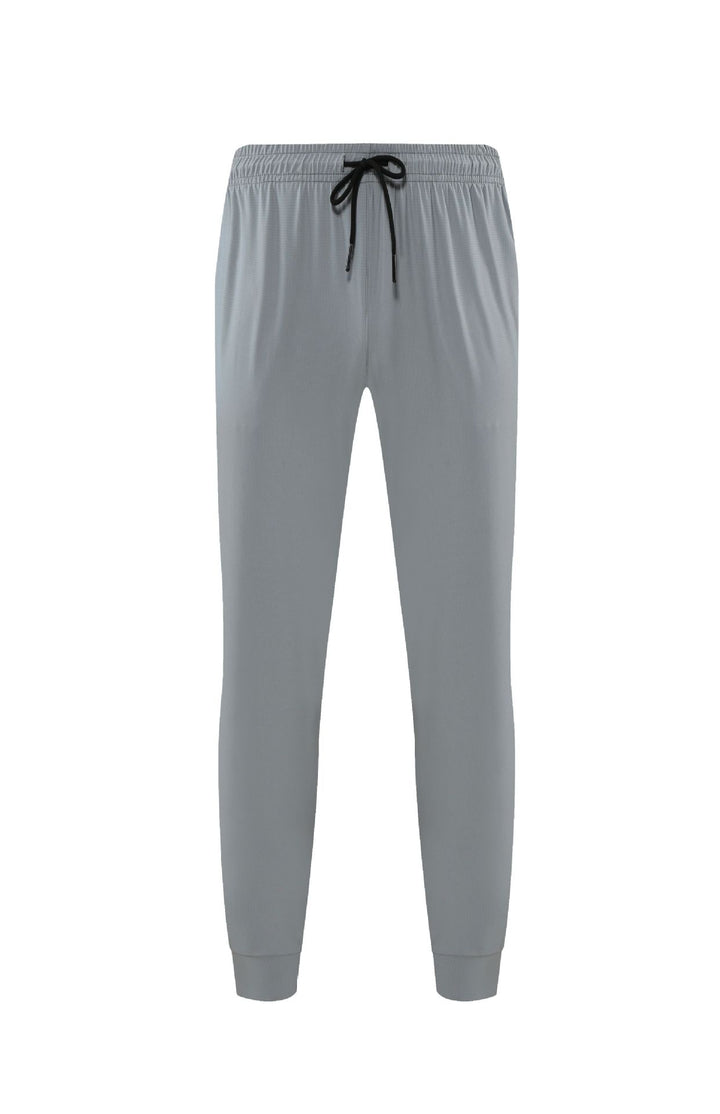 Pantaloni uomo casual larghi per primavera/estate. Abbigliamento sportivo comodo e traspirante per ogni giorno.