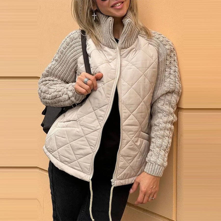 Giacca trapuntata donna elegante, collo alto, calda, per un look invernale chic e confortevole.