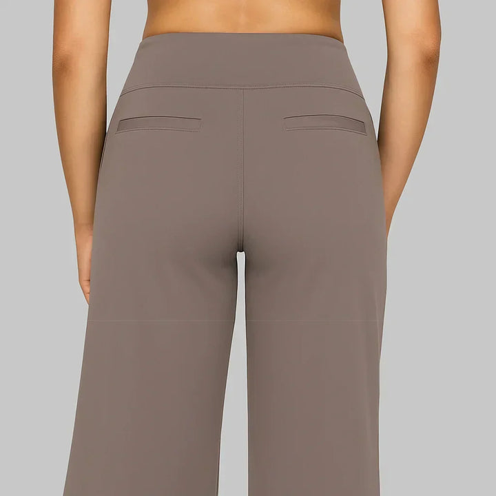 Pantaloni donna casual eleganti a vita alta, versatili per look quotidiani di tendenza con tasche.