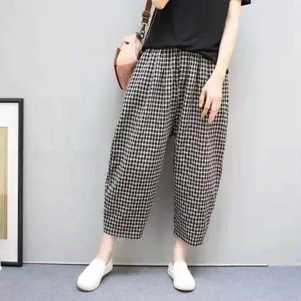Culottes pantaloni harem donna a quadri, vita alta, ideali per outfit moda primavera autunno, versatili ed eleganti.