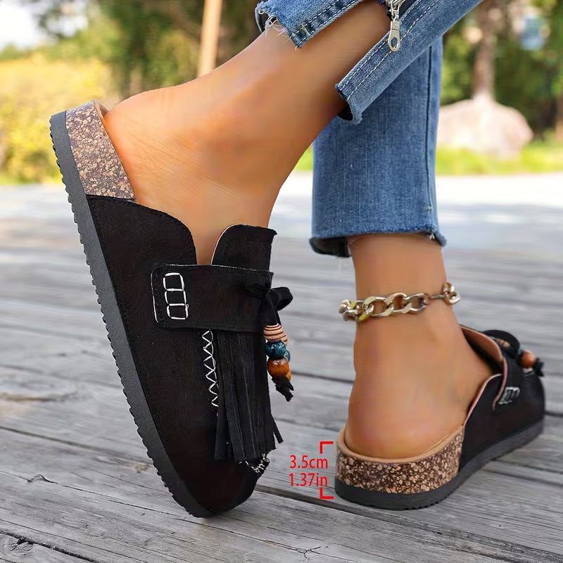 Eleganti sandali donna boho con nappe, ideali per la moda estiva e il comfort giornaliero.