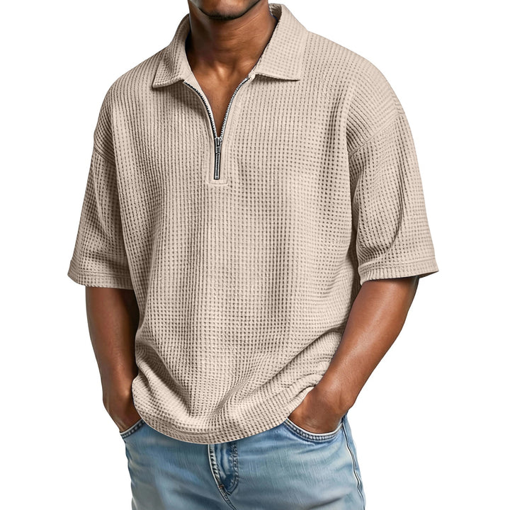 Polo uomo a maniche corte, in maglia a nido d'ape. Perfetta per un look estivo, casual e confortevole.