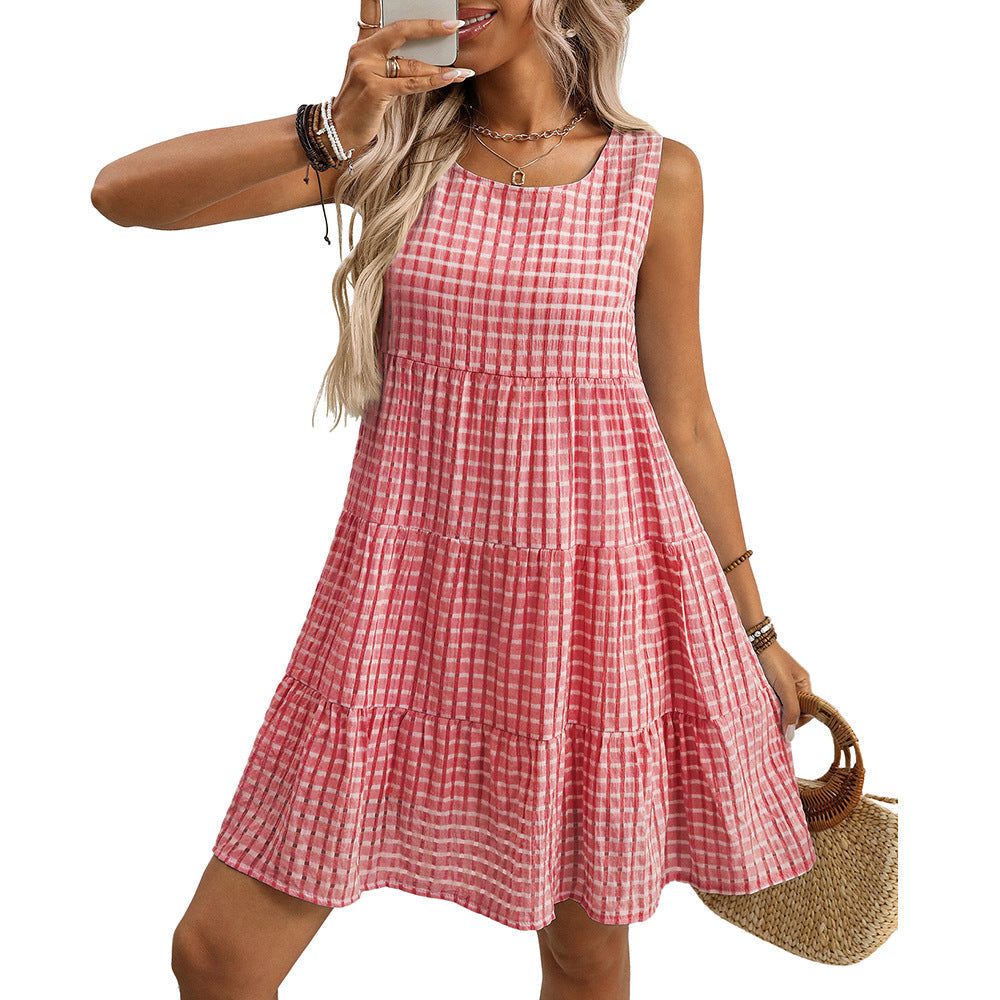 Elegante abito midi donna a quadri, senza maniche, perfetto per serate estive o eventi speciali. Vita alta.