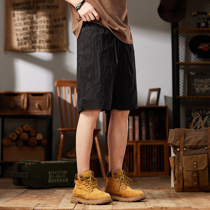 Moda uomo: pantaloncini estivi ad asciugatura rapida, vestibilità comoda per un look casual e sportivo.