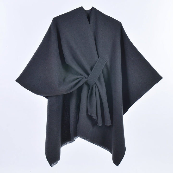 Poncho donna tinta unita elegante con laccetti, versatile per moda autunnale e stile minimalista.