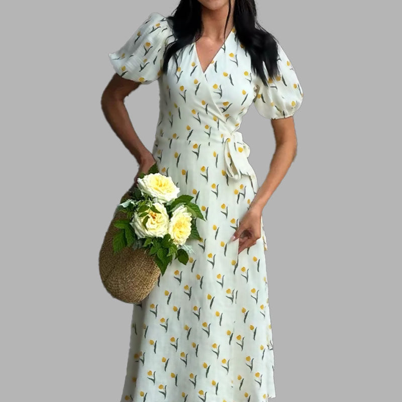 Abito midi donna con stampa floreale colorata, scollo a V profondo, ideale per outfit primaverili ed estivi casual chic.