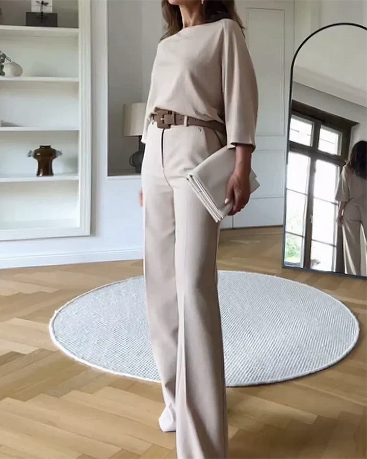 Completo donna elegante due pezzi con top a pipistrello e pantaloni larghi. Perfetto per outfit casual chic.