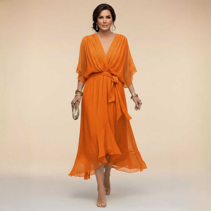 Abito donna midi fluido con scollo a V e cintura. Look elegante per matrimoni e cerimonie autunnali.