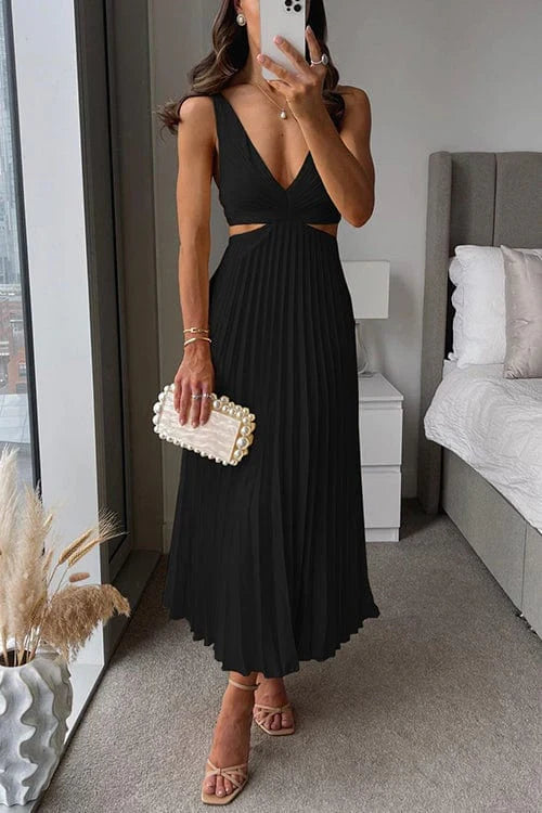 Abito midi da donna elegante con tessuto fluido e pieghettato, vestito cerimonia autunnale per un look sofisticato.