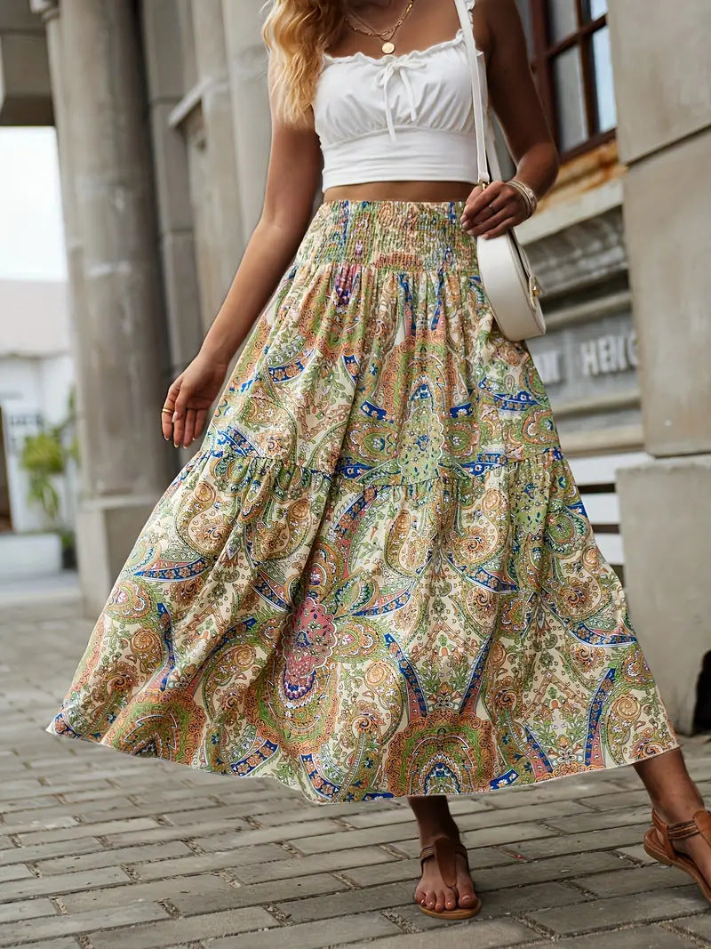 Gonna fluida elegante con stampa floreale, vestibilità comoda, ideale per l'estate.