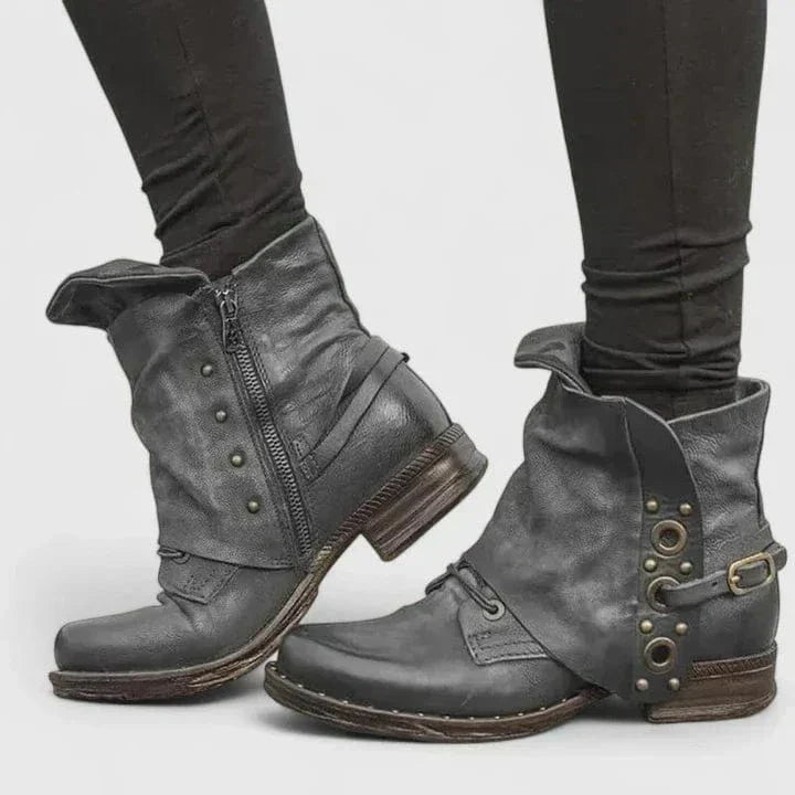 Eleganti stivaletti vintage da donna, perfetti per un look autunnale e invernale, con fibbia e zip.