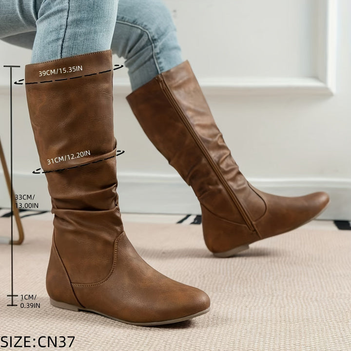Stivali eleganti al ginocchio da donna, tacco basso, zip. Perfetti per serate o outfit raffinati.