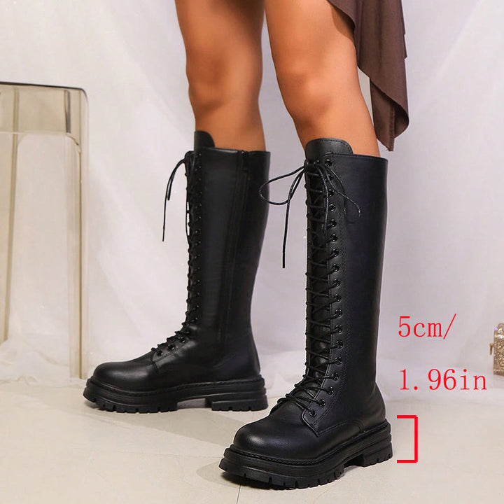 Audaci stivali platform neri da donna, altezza ginocchio, con lacci decorativi e zip funzionale per stile unico.