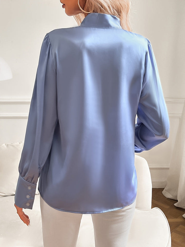 Camicetta da ufficio elegante da donna a maniche lunghe con raffinato fiocco al collo. Ideale per look professionali.