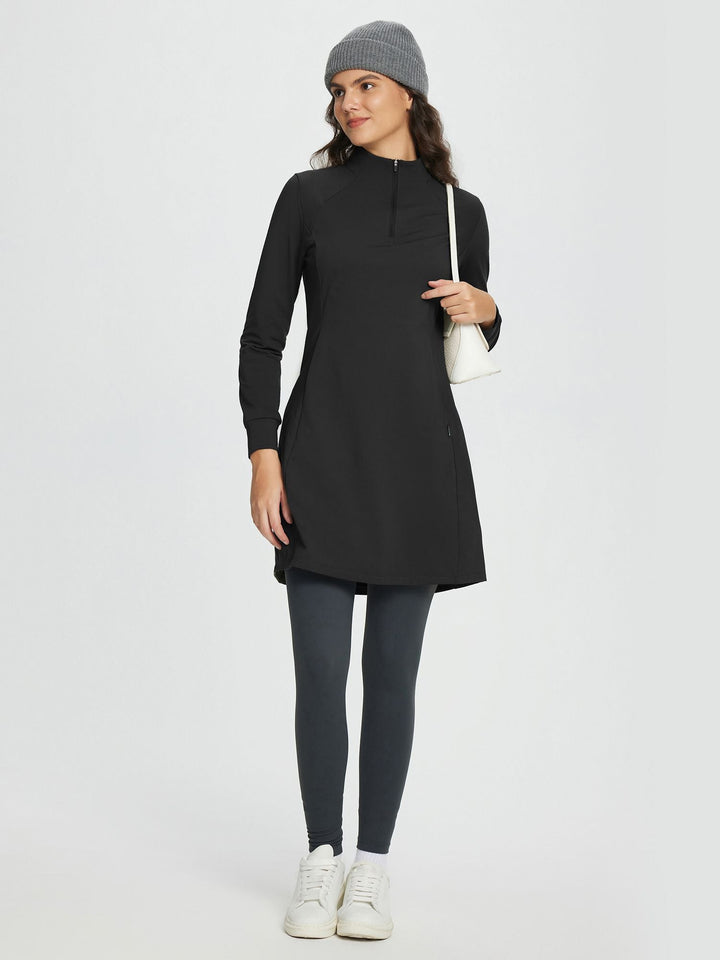 Abito donna invernale midi in maglia con collo alto e zip, un capo essenziale e chic.