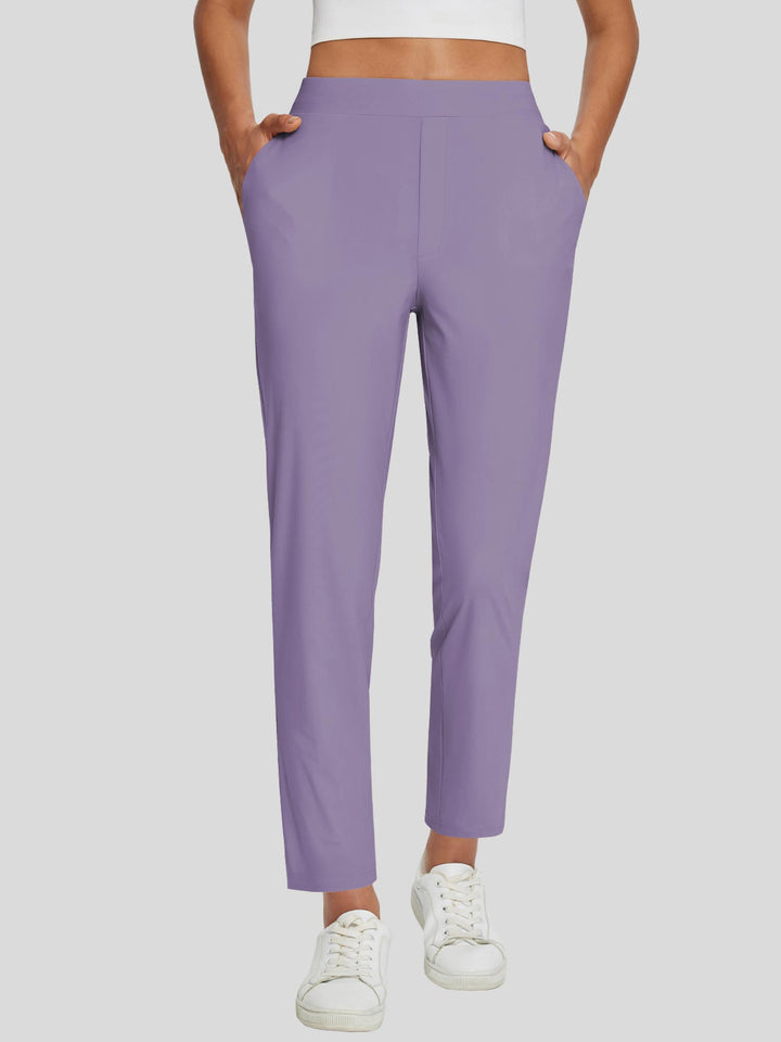 Pantaloni outdoor donna, vita alta, protezione solare UPF 50+, spacco alla caviglia, tasche.
