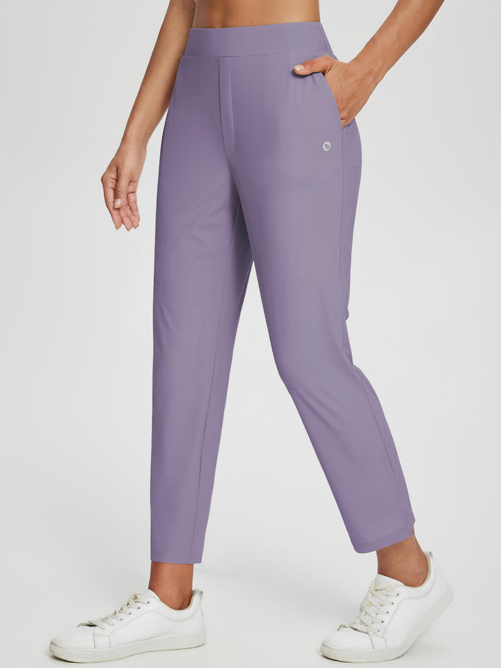 Pantaloni donna per clima caldo, vita alta, UPF 50+, spacco, tasche. Ideali per giornate soleggiate.