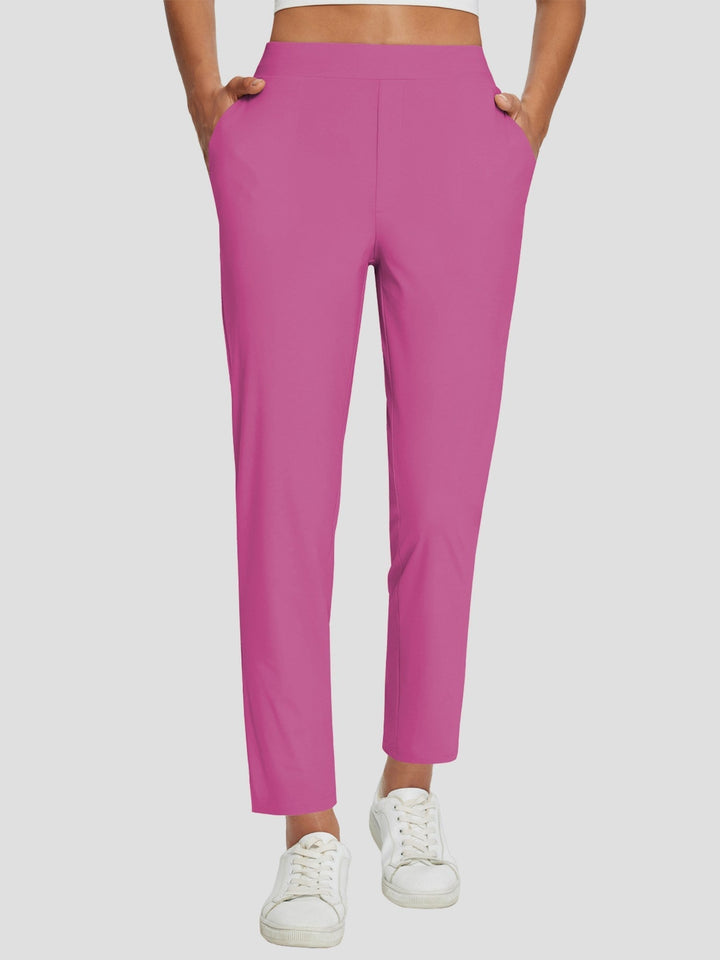 Eleganti pantaloni sportivi donna vita alta, spacco, UPF 50+, tasche. Per outdoor e tempo libero.