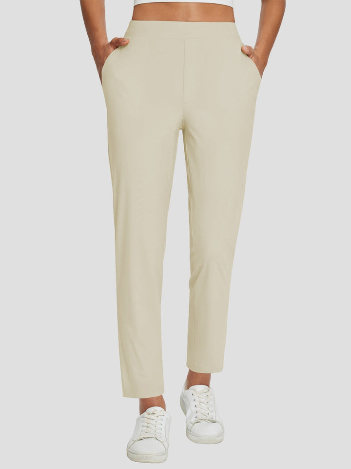 Pantaloni da hiking donna leggeri, vita alta, UPF 50+, spacco per libertà di movimento, tasche.
