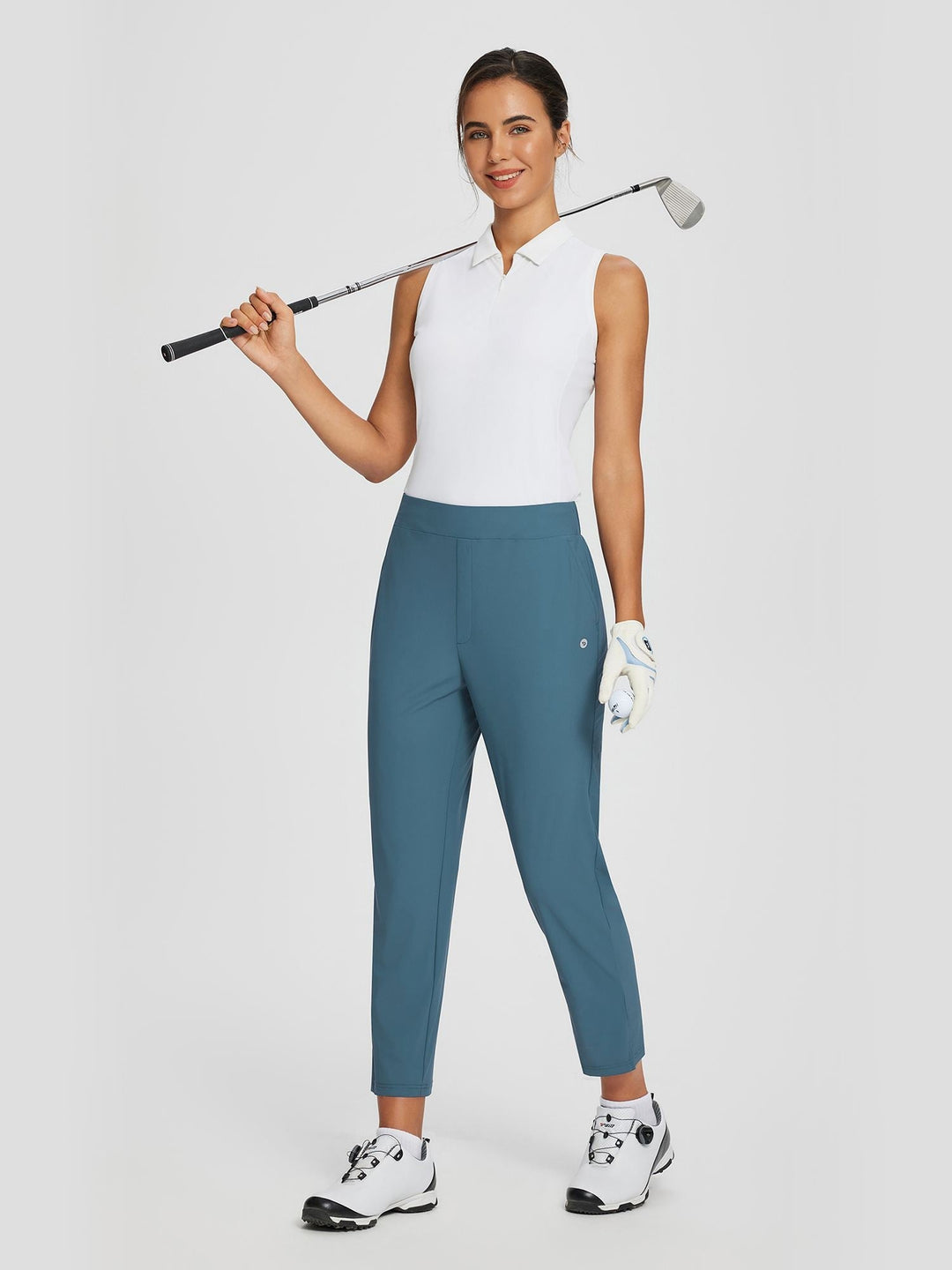 Pantaloni donna da viaggio UPF 50+, vita alta, spacco elegante, tasche con zip.