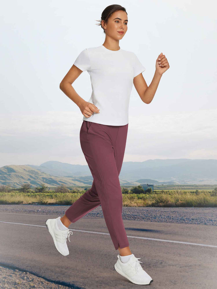Pantaloni donna resistenti all'usura, vita alta, UPF 50+, spacco e tasche per hiking.