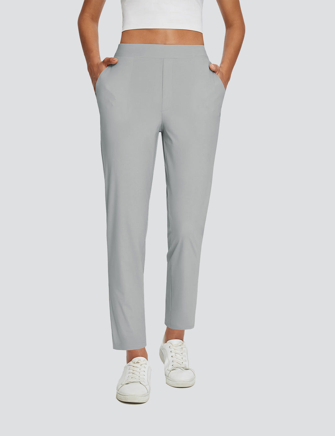 Pantaloni da donna per outdoor, protezione solare UPF 50+, vita alta, spacco e tasche cargo.