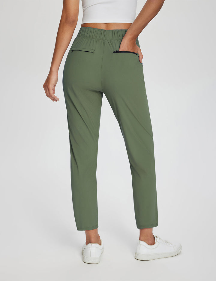 Pantaloni sportivi donna vita alta UPF 50+, spacco laterale e tasche multiple per outdoor.