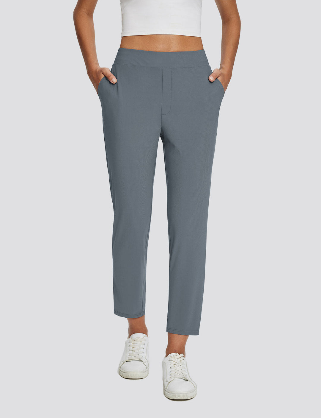 Comodi pantaloni sportivi donna vita alta, UPF 50+, spacco sottile. Tasche per l'essenziale.