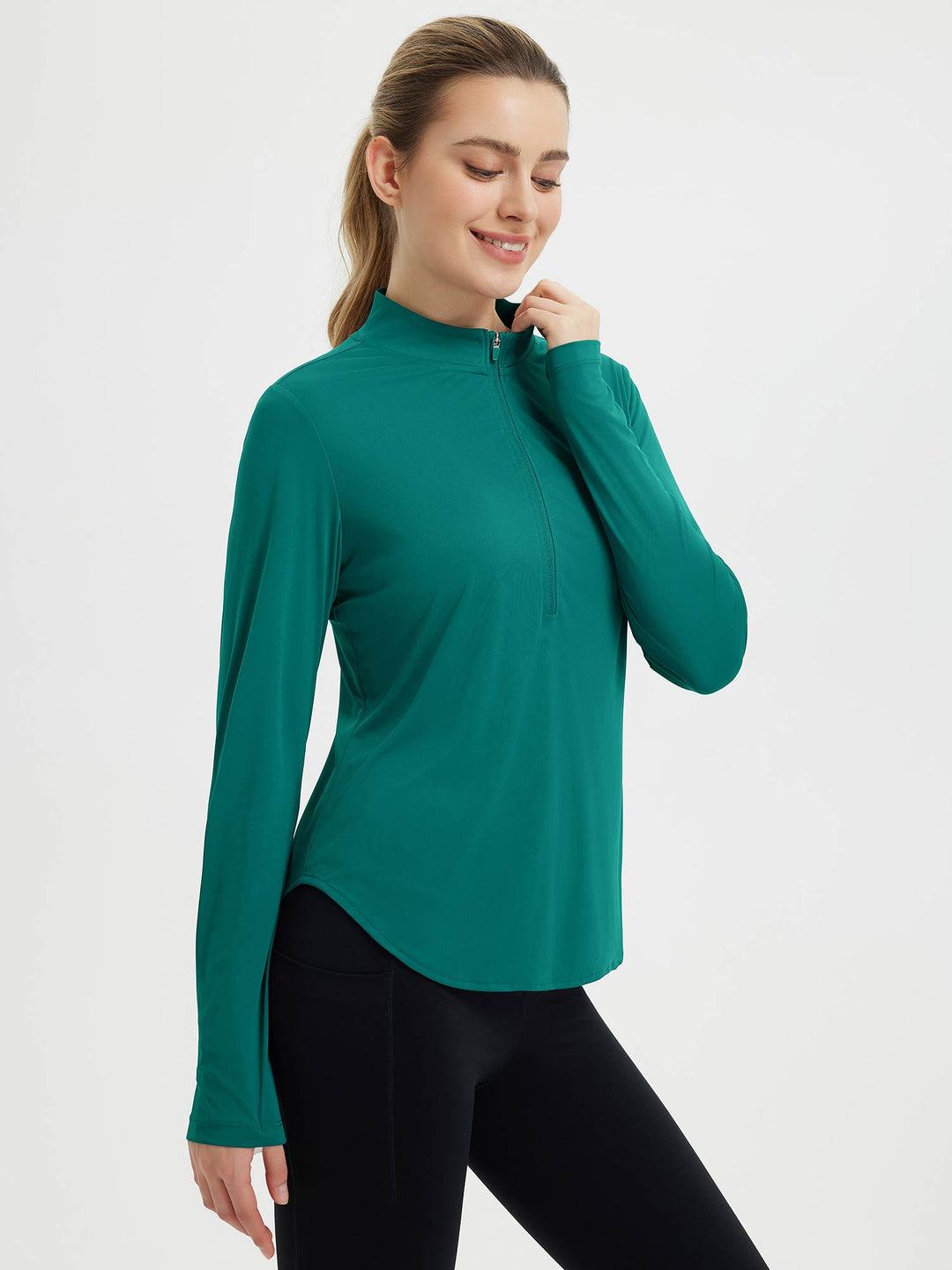 Maglia running donna leggera, maniche lunghe, fori pollici, mezza zip, per allenamenti dinamici.