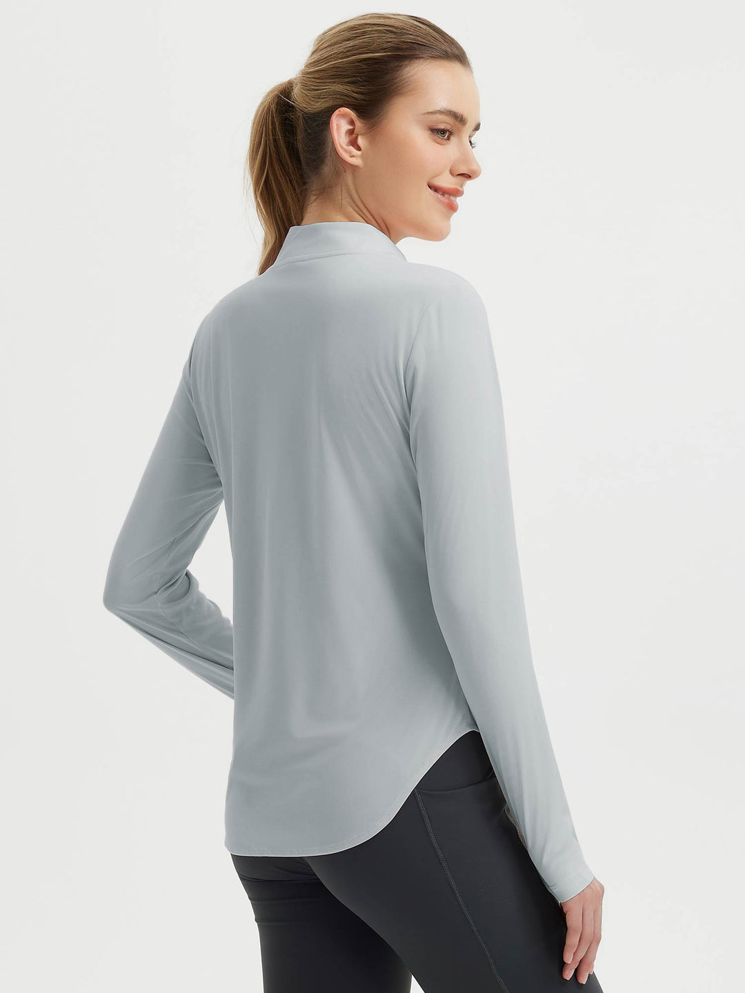 Maglia escursionismo tecnica donna, maniche lunghe, orlo arrotondato, fori pollici, mezza zip.