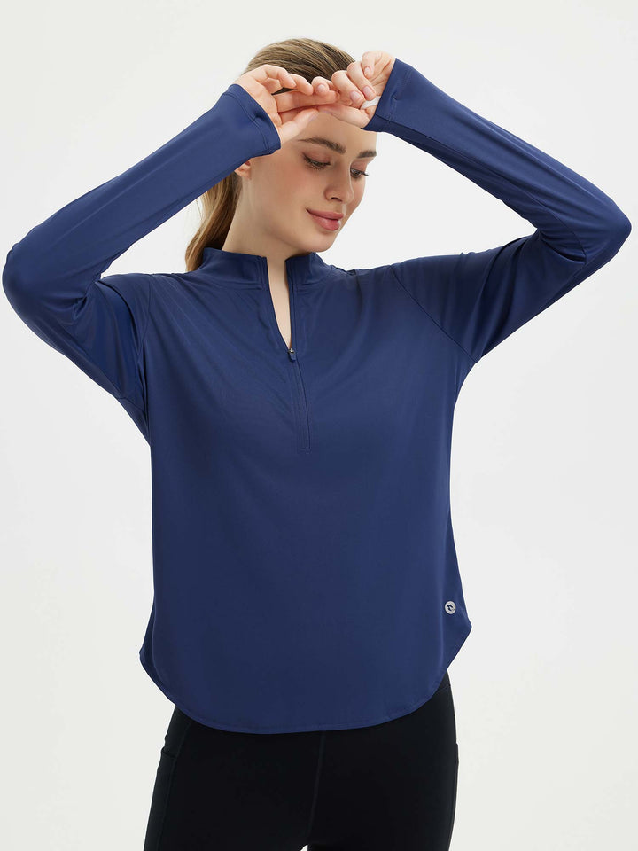Maglia outdoor donna versatile, mezza zip, fori pollici, ideale per attività sportive e tempo libero.