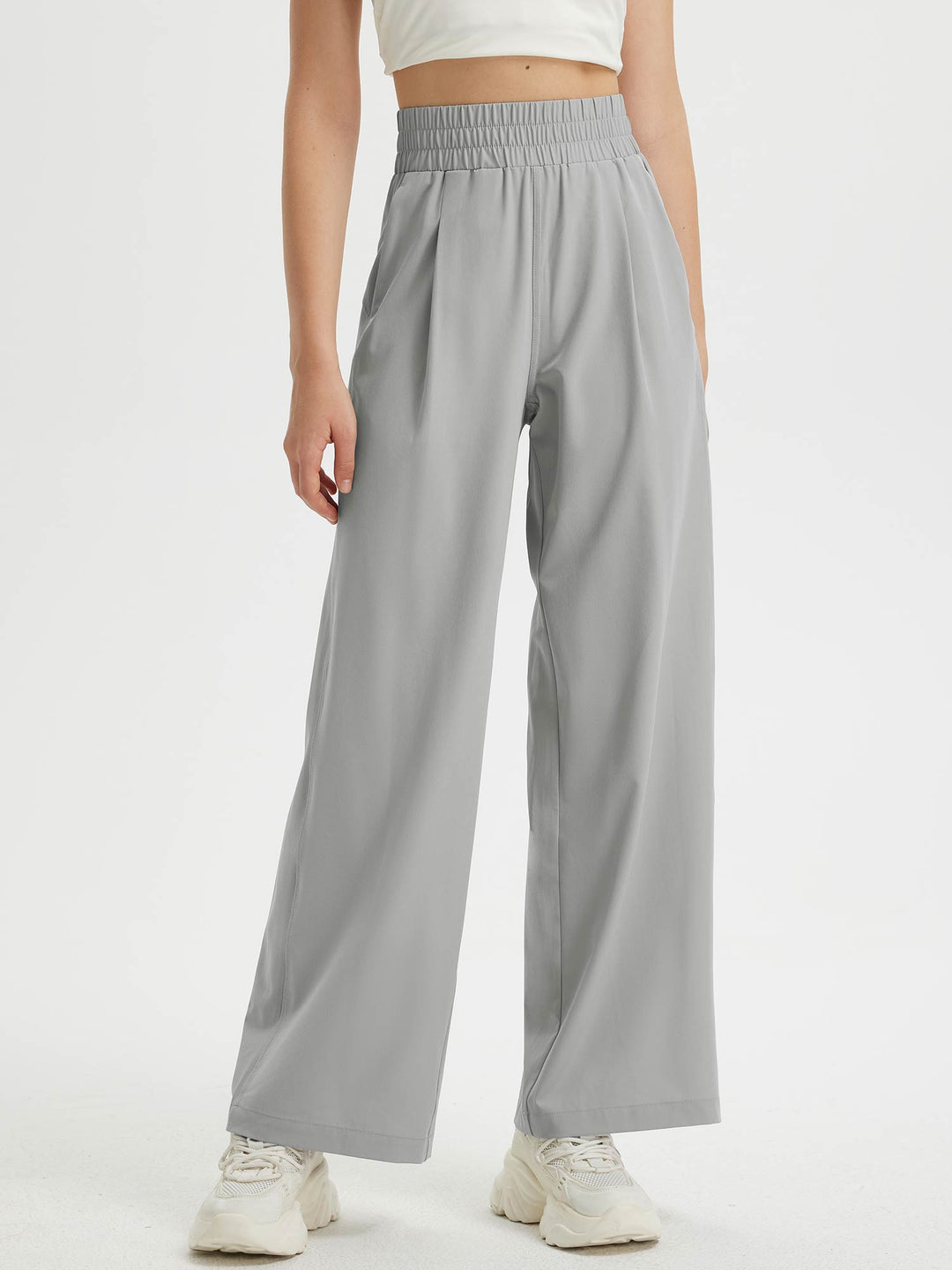 Abbigliamento donna: pantaloni con gamba larga, vita elastica e tasche. Perfetti per comfort tutto il giorno.