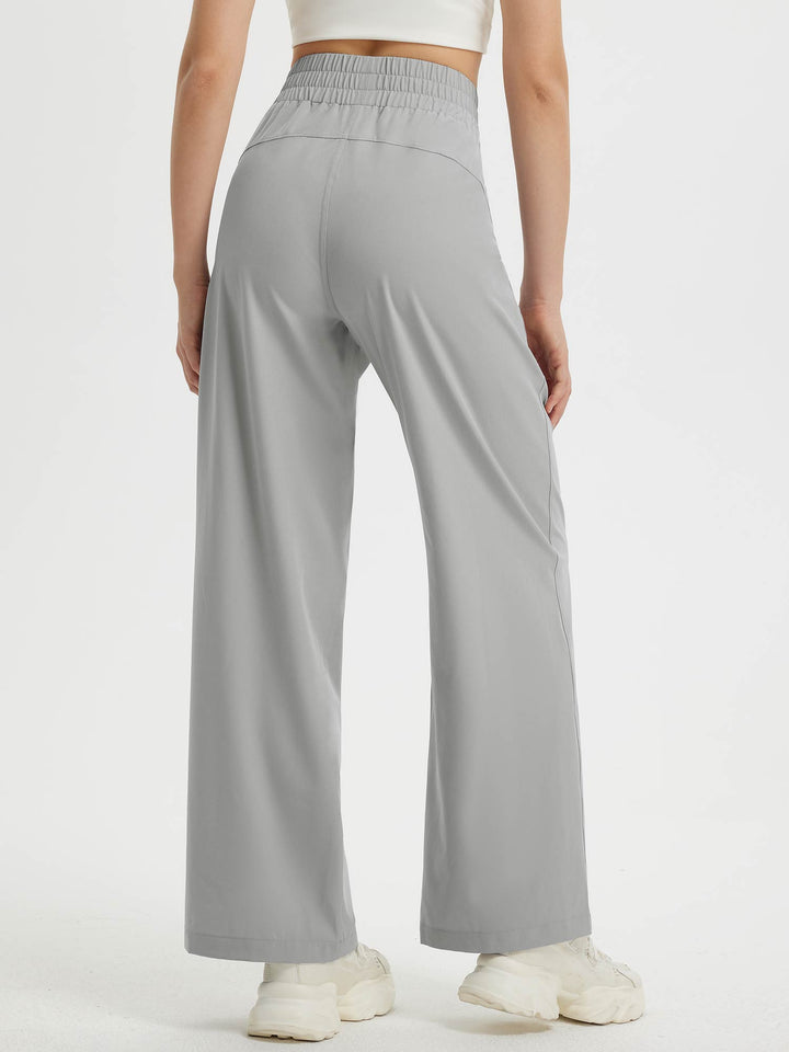 Pantaloni comodi donna, taglio a gamba larga, vita elasticizzata. Con tasche, perfetti per il tempo libero.