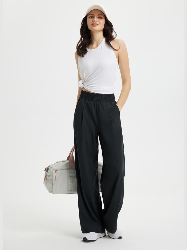 Pantaloni da donna ampi con vita elastica e tasche. Comfort superiore e stile moderno per ogni figura.
