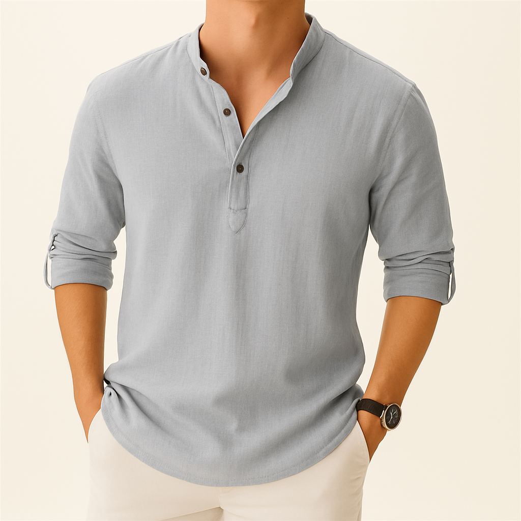 Uomo indossa camicia estiva leggera e traspirante a maniche lunghe, per un comfort estivo senza eguali.