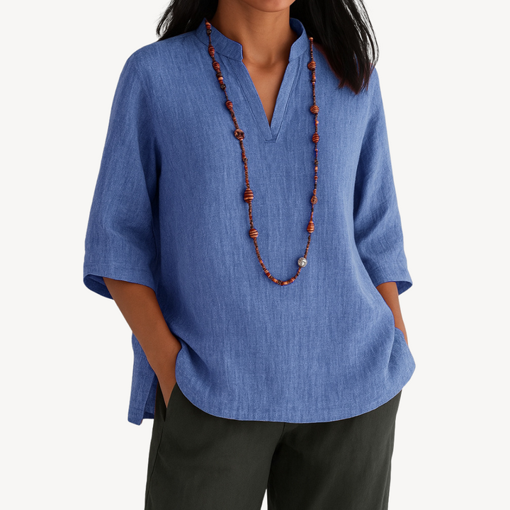 Blusa donna casual con scollo a V e maniche 3/4, perfetta per primavera/estate. Comoda ed elegante.
