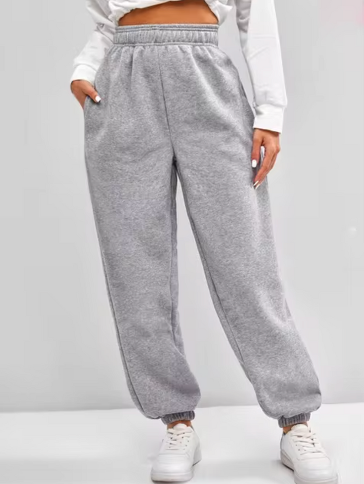Pantaloni jogger donna eleganti a vita alta, perfetti per un look casual chic o sportivo.