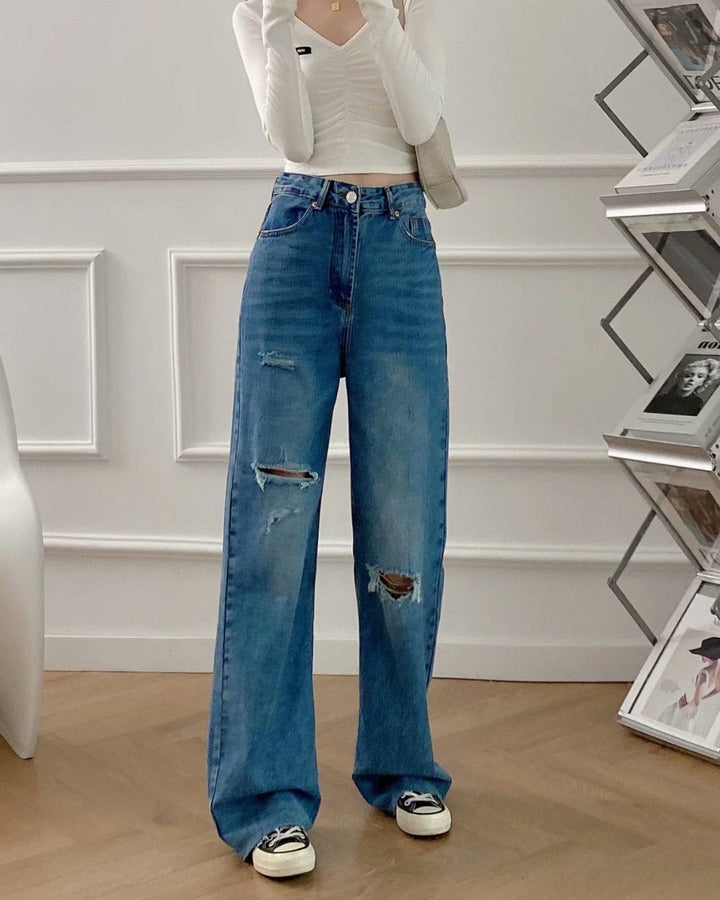 Pantaloni donna eleganti a gamba larga blu scuro, perfetti per un look chic e versatile in ogni occasione.