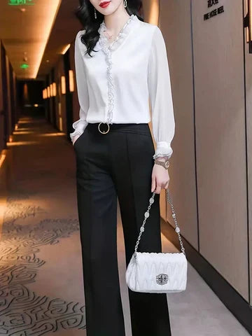 Blusa versatile da donna, manica lunga, ideale per look casual chic autunnali. Abbigliamento donna trendy.