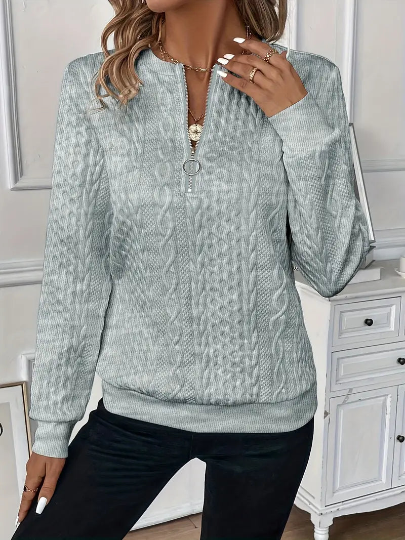 Maglione donna scollo a V con cerniera, capo di abbigliamento versatile per autunno e inverno.