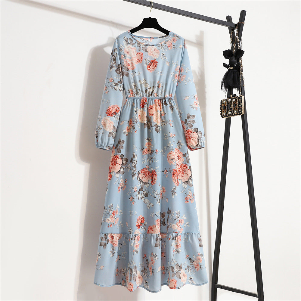 Abito lungo floreale da donna, scollo rotondo, silhouette a trapezio, perfetto per un'eleganza fluida.