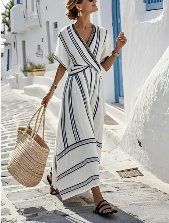 Abito donna estivo linea ad A, scollo a V e righe astratte. Confortevole e trendy per l'estate.