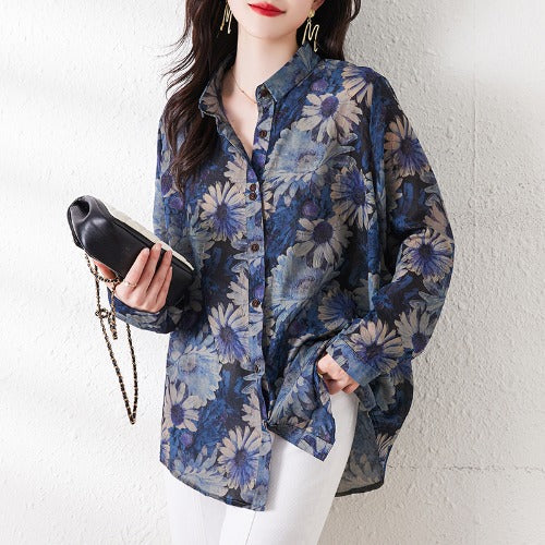 Camicia donna plus size elegante con stampa floreale, collo a revers e maniche lunghe. Perfetta per look raffinati.