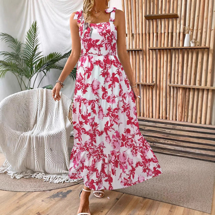 Elegante vestito midi blu da donna stampato con pizzo, ideale per spiaggia e moda estiva casual.