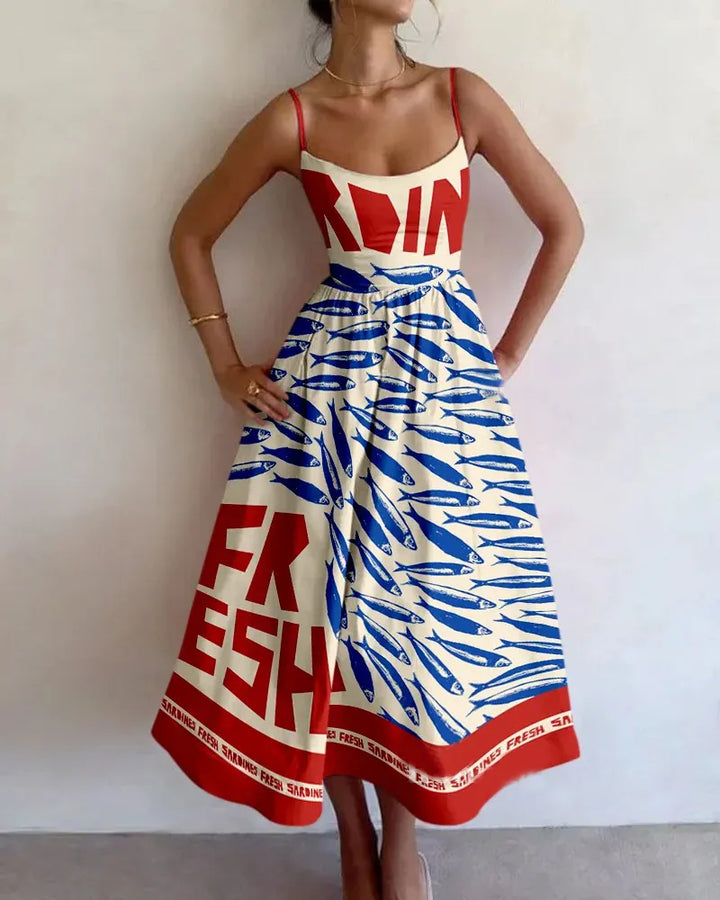 Abito svasato midi donna elegante con stampa pesci per invitata a matrimonio, ideale per moda estiva.