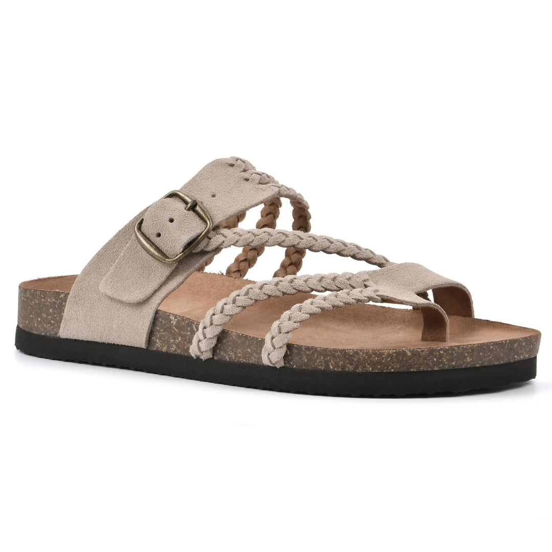 Sandali donna bassi slip-on con cinturini intrecciati e dettaglio traforato per comfort estivo. Scarpe estive casual.