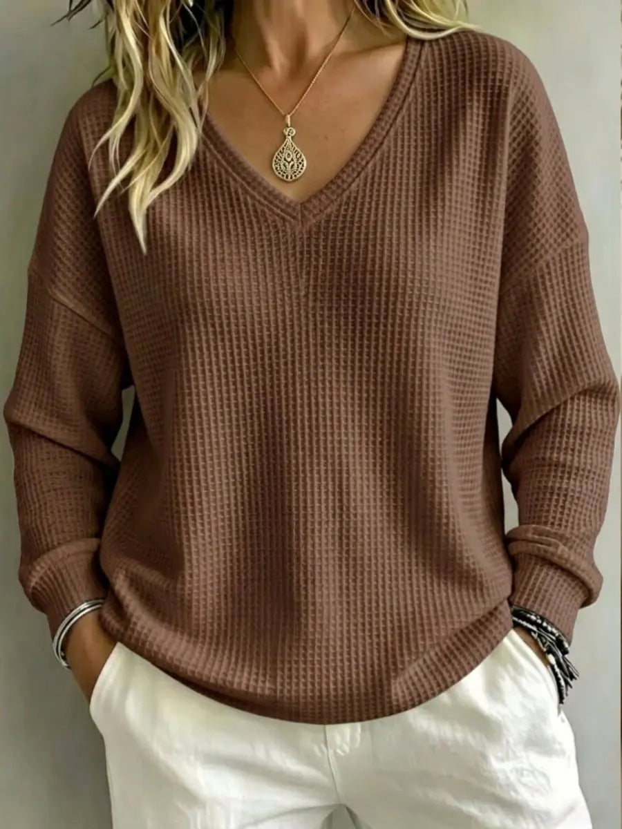 Maglia donna versatile, scollo a V e stile rilassato, perfetta per moda femminile e comfort.